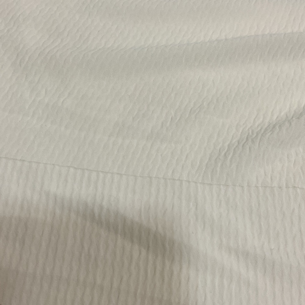 Cream colored blouse fabric